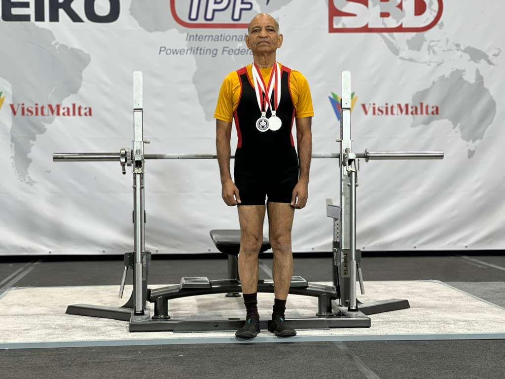 Mr. Asthana displaying his World Championship Silver medal after supraspinatus tear rehabilitation